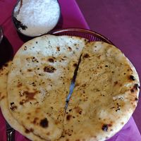 Garlic naan and free rice at Indian Royal  in Liege