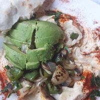 Nice filling plate of avocado with chickpea humus at Nish Nush in New York City