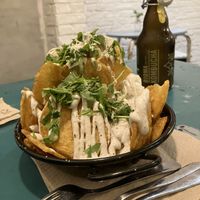 Patatas fritas con salsa trufada  at Quinoa in Barcelona