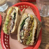 tex-mex burger. Avocado, pico de gallo, cheese, quinoa burger, ...  at Quinoa in Barcelona