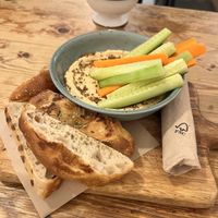 Hummus with sourdough and veggies   at Quinoa in Barcelona