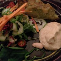 Vegan quiche with hummus and salad at Quinoa in Barcelona