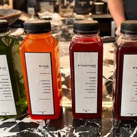 Cold pressed juices (these are mocks). Cropped the last one as contains honey.  at Copains - Le Studio  in Paris