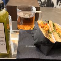 Ivy cold pressed juice & vegan bagel.  at Copains - Le Studio  in Paris