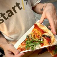 The slice of Basquiat vegan pizza at PizzOria in Premia De Mar