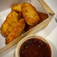 Delivered vegan nuggets with sweet'n'sour sauce at PizzOria in Premia De Mar