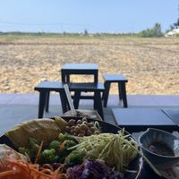 Raw salad bowl with a nice view.   at Nghe Coffee in Hoi An