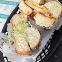 Avo bagel, and a hash brown bagel at Out of Order in Bendigo