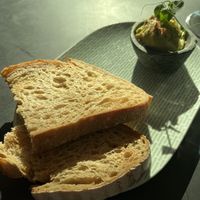 Bread with avo spread the waiter subbed in  at Trude & Töchter in Vienna