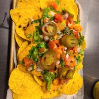 Quinoa nachos with extra cheese sauce at KNOW Eatery in Lafayette