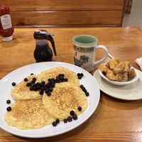 Gluten-free/ vegan pancakes with blueberries and house fries  at Sawyer's Farmhouse Breakfast in Pigeon Forge