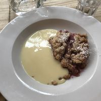Apple and berry crumble with soya custard  at Playwrights in Coventry