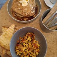 Peanut butter & banana pancakes, tofu scramble. at GAL Cafe in Lisbon