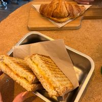 Ham and cheese toasted sandwich and a croissant with fig compote  at GAL Cafe in Lisbon