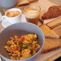 Tofu scramble, toast, coffee, vegan croissants at GAL Cafe in Lisbon