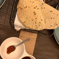 Complimentary papadum with tamarind and chilli   at Jimbu in Evora