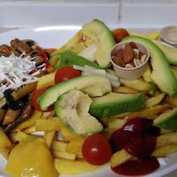 Grilled vegetables with vegan cheese, Avocado, tomato and french fries. at Los Colloncos in Collipulli