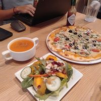 Spiced carrot soup, cranberry pumpkin salad and turkey pizza at WellSmoocht in West Singapore