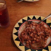 Egyptian stew over rice and vodka hibiscus lemonade at Poppi's Anatolia in Eugene