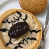 Coconut almond tart and chocolate gianduia biscotto  at Ratatouille in Turin