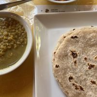 Coconut roti (comes with dhal and onion salad + juice + caffe/tea)  at Sri Lankan Kussiya in Matara