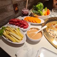 Mini mais, patate dolci arancioni, misto verdure patate e frutto di loto, salsa con arachidi. at Shoo Loong Kan 小龙坎火锅 in Milan