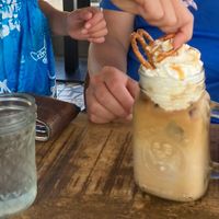 latte with vegan whipped cream!  at Santos Coffee With Soul in Oranjestad