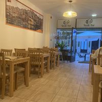 Inside and outside tables  at Verde Hut in Porto