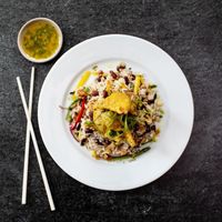 All vegan Stir House Box topped with a fried Oyster Mushroomm  at Stir House - Vegan Stir Fry in Atlanta