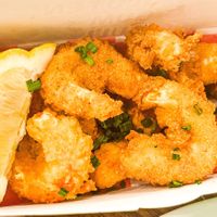 Vegan Shrimp battered to perfection, made of Konjac Root (Asian veggie that assists w/ gut health). This dish is a winner!!! Get it with the Mongolian sauce or Red Pepper Aioli!  at Stir House - Vegan Stir Fry in Atlanta