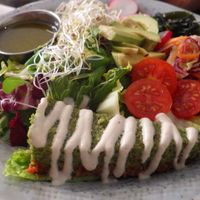 Kale tart and salad with dressing at Matapoteket in Stockholm