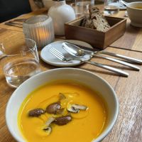 Pumpkin-coconut soup with ginger and oven mushrooms   at WILLICHS in Mainz