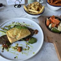 Tofu with grilled aubergine, pesto, asparagus and veggies of choice  at Huset Tønsberg in Tonsberg