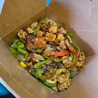 Jerk Tempeh vegan rice bowl at Di Big Jerk in Gainesville