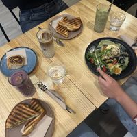 Grilled sandwiches, cinnamon rolls and eggs Benedict   at Asante in Barcelona