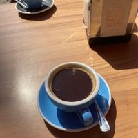 Coffee on their terrace at 1000 Cups Roastery in Madrid