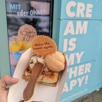 cinammon roll with cherry and peach ice cream at Sweet n joy  in Frankfurt
