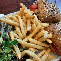 Delicious vegetable sandwich with caramelized onions, grilled red peppers, avocado, hummus, and zucchini at Carnegie Diner & Cafe in New York City