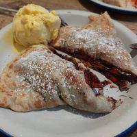Strawberries and dark chocolat with mango ice cream at Crêperie La Rue in Madrid