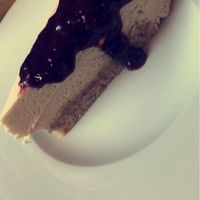 Cheesecake with massive pile of jam on it  at Soul Kitchen in Sofia