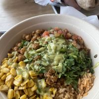 Bowl with plant-based crumble, avocado vinaigrette   at Mucho Burrito in Kamloops
