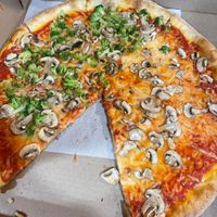 Vegan pizza with mushrooms and half broccoli  at Roman's Pizza House in Absecon