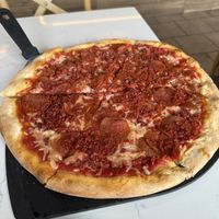 The vegan pizza with vegan bacon, vegan pepperoni, and vegan cheese    at Roman's Pizza House in Absecon