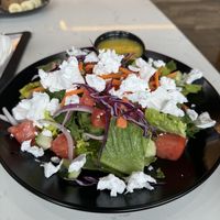 The vegan toss salad but substituted the cheese with vegan feta cheese and their house made lemon vinaigrette dressing    at Roman's Pizza House in Absecon