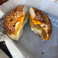 Bagel sandwich-had to take a bite, it looked so good! Just Egg + vegan sausage n cheese. Really hit the spot. Opens at 7 a.m. now for breakfast & coffee! at Roman's Pizza House in Absecon