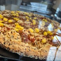 Mmm..breakfast pizza with egg, sausage & bacon crumbles. All vegan. Excellent choice. Love the everything seasoning on the crust. at Roman's Pizza House in Absecon
