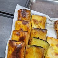Stuffed pastries: eggplants or spinach and olives at PastaRun in Siracusa