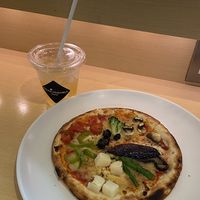 Apple juice and vegan pizzaa  at HND - Chaya Vegan Friendly Tokyo - T3 in Ota