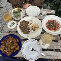 Olives, gremolata potates, tomato salad and FIR gras (and orange wine, amazing as well)  at Fir in Malmo