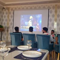 Watching criquet at Dostana Indian Restaurant in Samarkand